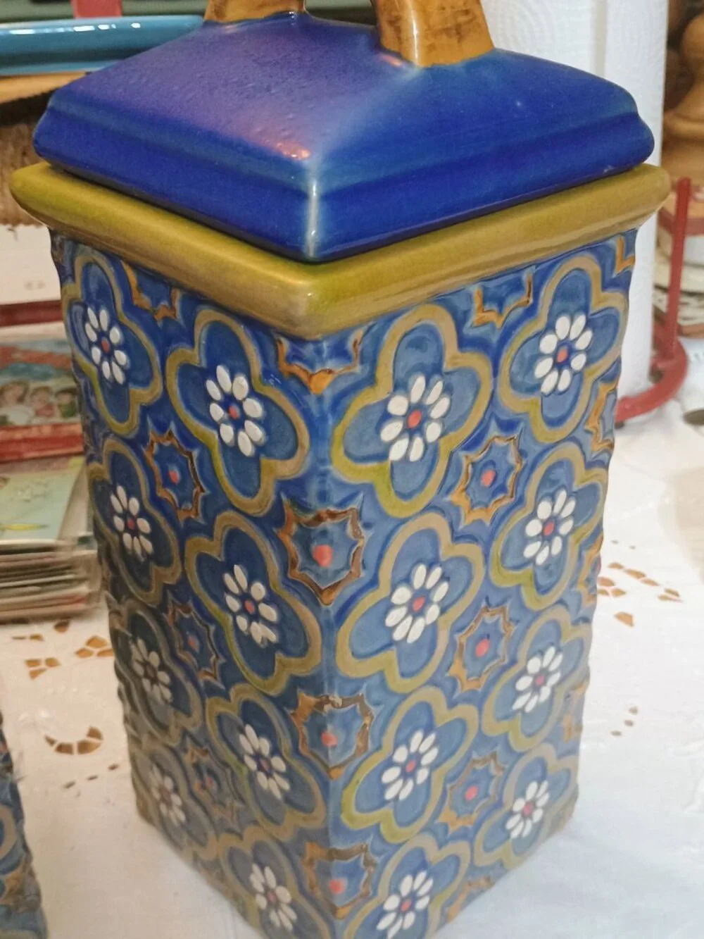 2 blue and gold, assorted sizes lidded canisters